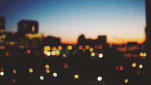 Bokeh Cityscape At Dusk.jpg Wallpaper