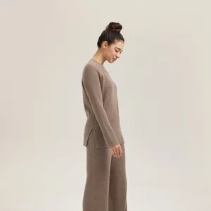 Bold Minimalist Fashion Statement With Black Dress And Hat Wallpaper