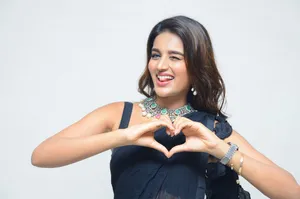 Bollywood Actress Nidhi Agarwal At The Ismart Shankar Movie Pre-release Event Wallpaper