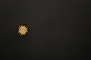 Bottle Cap Black And Gold Iphone Wallpaper