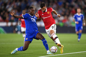 Boubakary Soumaré Showcasing His Football Prowess Against An Opponent Wallpaper