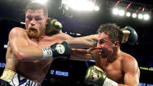 Boxing Champion Saul 'canelo' Alvarez In Action Wallpaper