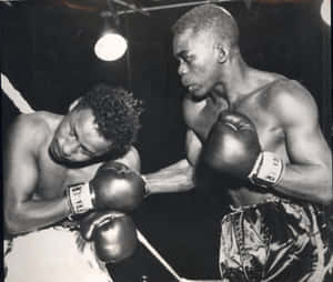 Boxing Legend Ike Williams In Action Wallpaper