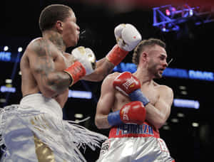 Boxing Superstar Gervonta Davis Delivering A Crushing Right Hand. Wallpaper