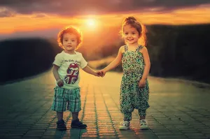 Boy Holds Hand Sister Wallpaper