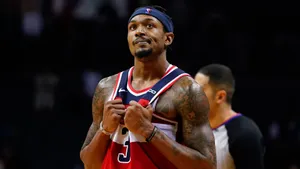 Bradley Beal Clutching His Jersey Wallpaper