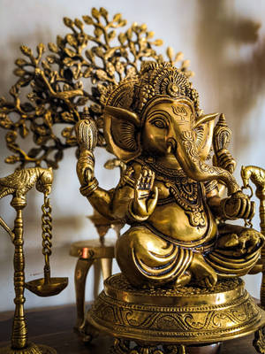 Brass Ganesh 4k Statue Wallpaper