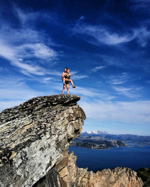 Brave Couple Under The Sky Wallpaper