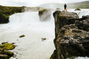 Brave Man In Waterfall Wallpaper