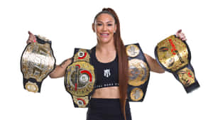 Brazilian-american Martial Artist Cris Cyborg Displaying Championship Belts Wallpaper