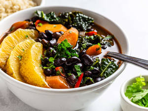 Brazilian Black Bean Stew Feijoada In Beautiful Plating Wallpaper