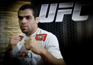 Brazilian Mixed Martial Artist Renan Barão Against Ufc Background Wallpaper