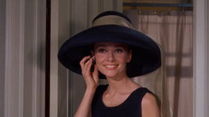 Breakfast At Tiffany's Holly Smiling Wallpaper