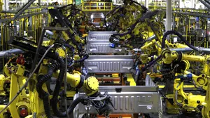 Breaking Down Barriers: Blue Collar Workers Represent A Strong And Resilient Force. Wallpaper