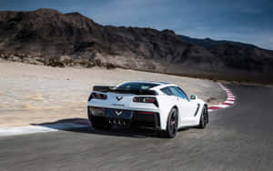 Breathtaking Chevrolet Corvette Z06 In Action Wallpaper