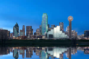 Breathtaking Dallas Skyline At Sunset Wallpaper