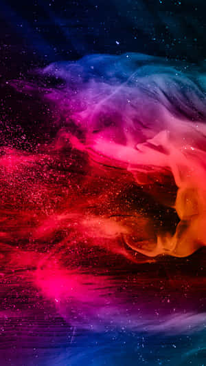 Breathtaking Display Of Bursts Of Colorful Smoke Wallpaper