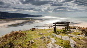 Breathtaking Panoramic View Of Afon Mawddach River In Wales Wallpaper