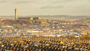 Breathtaking Skyline View Of Bradford, United Kingdom At Sunset. Wallpaper