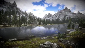 Breathtaking Skyrim Landscape With The Majestic Mountain Backdrop Wallpaper