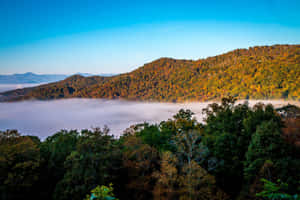 Breathtaking Sunrise Over The Blue Ridge Mountains Wallpaper