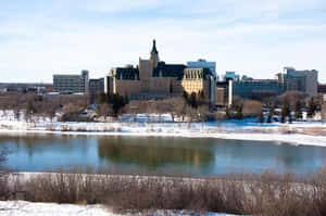 Breathtaking Sunset Over Saskatoon Downtown Skyline Wallpaper