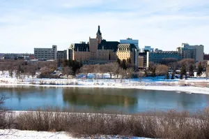 Breathtaking Sunset Over Saskatoon Downtown Skyline Wallpaper