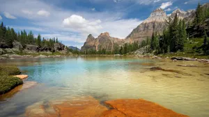 Breathtaking View Of A Beautiful Mountain At Sunset Wallpaper