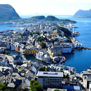 Breathtaking View Of Ålesund At Night Wallpaper