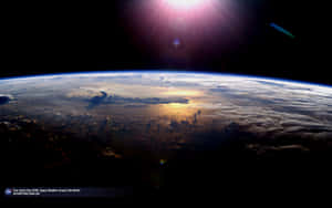 Breathtaking View Of Earth From Outer Space Wallpaper