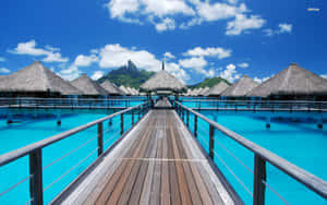 Breathtaking View Of The Pristine Bora Bora Beach Wallpaper