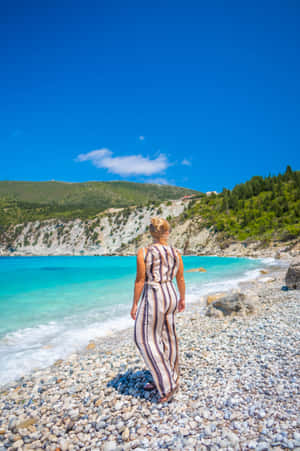 Breathtaking View Of The Pristine Greek Beach Wallpaper