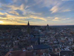 Breathtaking View Of Toledo Cathedral In Spain Wallpaper