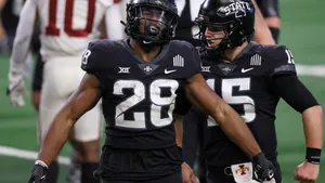 Breece Hall Iowa State Cyclones Football Action Wallpaper