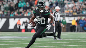Breece Hall New York Jets Running Back Action Wallpaper
