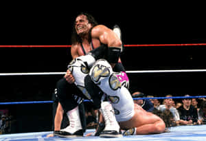 Bret Hart And Shawn Michaels Clash At Wrestlemania Wallpaper