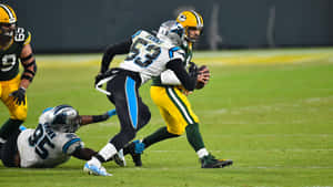 Brian Burns Sacking Quarterback Wallpaper