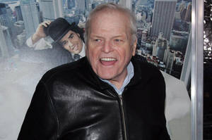 Brian Dennehy In Black Jacket City Background Wallpaper