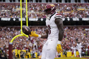 Brian Robinson Jr Celebrating Touchdown Wallpaper