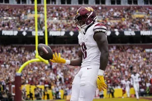 Brian Robinson Jr Celebrating Touchdown Wallpaper