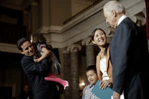 Brian Schatz And Family With Joe Biden Wallpaper