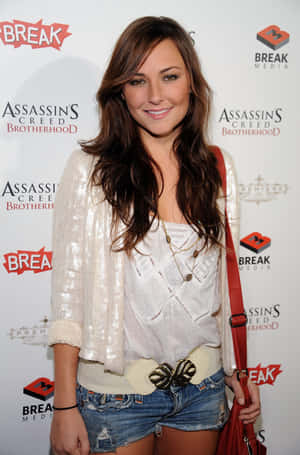 Briana Evigan Smiling Elegantly In A Photoshoot Wallpaper