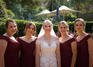 Bride With Bridesmaid In Red Wallpaper