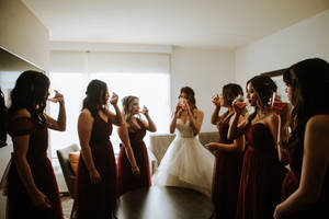 Bridesmaid With Bride Drinking Wine Wallpaper