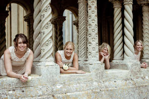 Bridesmaids In Concrete Pillars Wallpaper