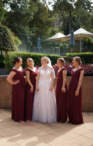 Bridesmaids In Red Dresses Wallpaper