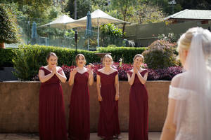 Bridesmaids Looking Amazed Wallpaper