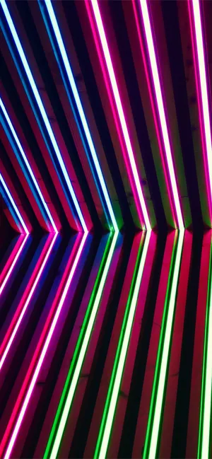 Bright Neon Lights Splashing Across The City Skyline Wallpaper