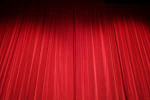 Bright Red Theater Curtains Wallpaper
