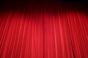 Bright Red Theater Curtains Wallpaper